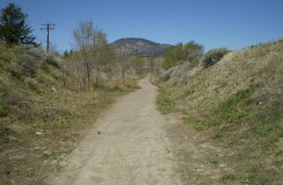 The KVR railbed heads north towards Mt Nkwala, Kettle Valley Railway Penticton to Summerland, 2011-05.